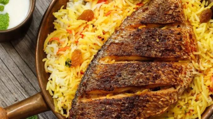 A boul of mouthwatering Malabar Fish Biryani with rait